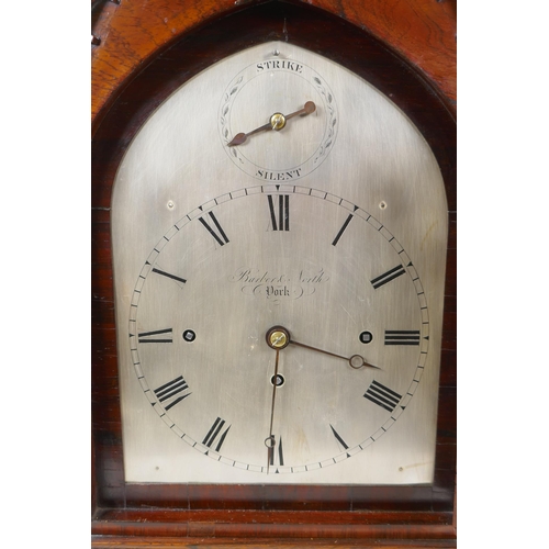 601 - A fine early C19th gothic style rosewood bracket clock, the arched case with pierced sides and clust... 