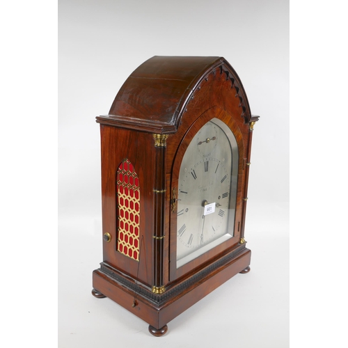 601 - A fine early C19th gothic style rosewood bracket clock, the arched case with pierced sides and clust... 