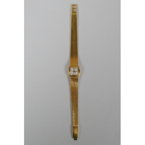 604 - An International Watch Co 18ct gold lady's cocktail watch, 33.3g gross