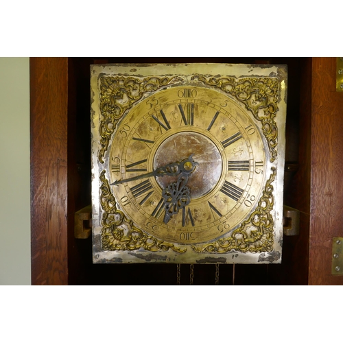 605 - An early mahogany case longcase clock with glazed door and brass and silvered dial, the movement str... 