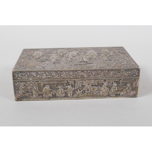 610 - A late C19th Chinese Da Xing silver box, with repousse decoration depicting the eight immortals in a... 