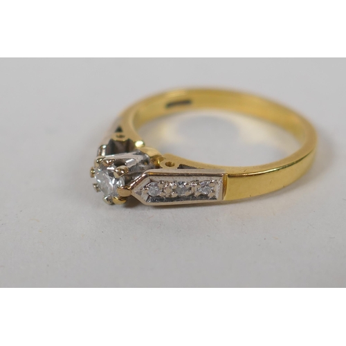 615 - An 18ct yellow gold and diamond ring, with a central set diamond and three diamonds set to each shou... 