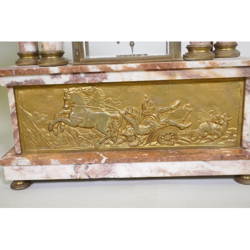 617 - A C19th French rouge marble clock with bronze mounts, the case surmounted by an eagle signed L. Caru... 