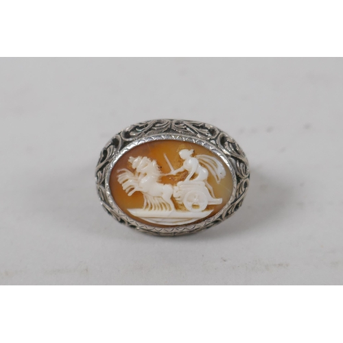 618 - An antique silver cameo bracelet with Greco Roman decorative panels, and a matching ring, size L/M