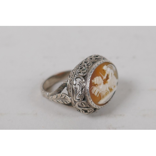 618 - An antique silver cameo bracelet with Greco Roman decorative panels, and a matching ring, size L/M