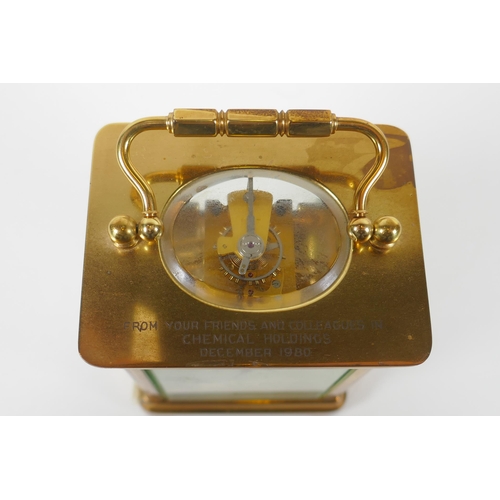 621 - A brass cased Henley carriage clock, retailed by Charles Greig, the dial with Roman numerals, 8 x 6c... 