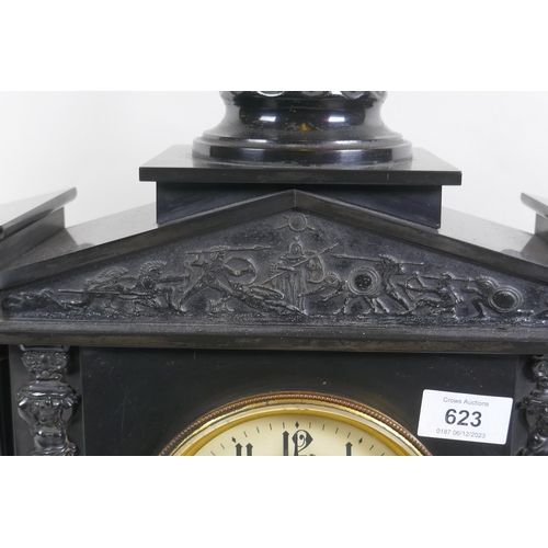 623 - A C19th slate mantel clock of classical form, with carved decoration to the pediment and brass dial ... 