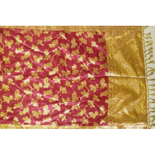 63 - A silk table throw with gilt thread embroidered decoration, 54 x 174cm and a vintage embroidered cus... 