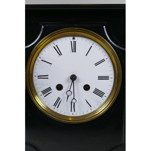 634 - A late C19th French slate mantel clock, with an enamel dial and Roman numerals, the movement strikin... 