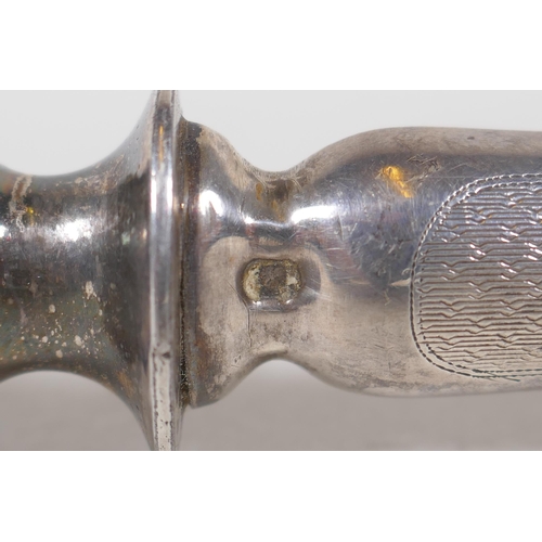 638 - An antique French silver handled lamb leg holder, together with and antique hallmarked silver handle... 