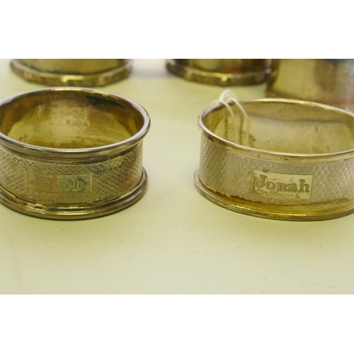 642 - Five silver napkin rings, Birmingham 1983, and two others, 205g