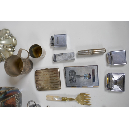 646 - A quantity of silver plate to include tea sets, flat ware, lighters, cigarette cases, trays etc