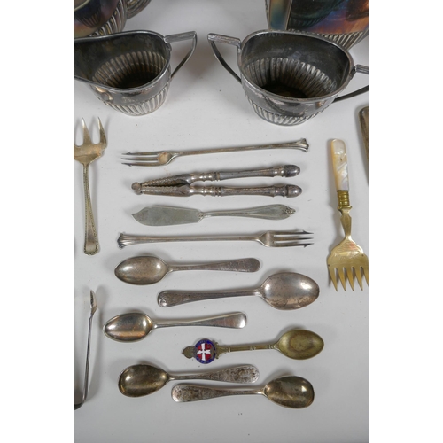 646 - A quantity of silver plate to include tea sets, flat ware, lighters, cigarette cases, trays etc