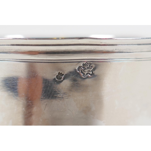 649 - An antique continental silver pot raised on tripod supports, 80.8g, probably French