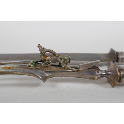 655 - A C19th French silver handled carving knife and fork set, with deer decoration, boxed, 33cm long