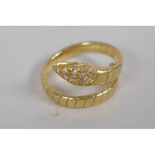 677 - An 18ct gold snake ring, the head and eyes set with diamonds, 7.3g approx size N