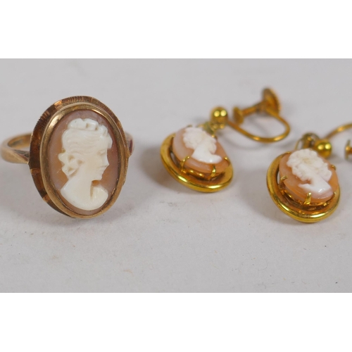 679 - A 9ct gold cameo ring, size M, 4.3g, and a pair of 9ct gold cameo earrings