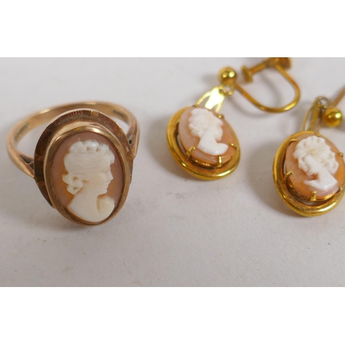 679 - A 9ct gold cameo ring, size M, 4.3g, and a pair of 9ct gold cameo earrings