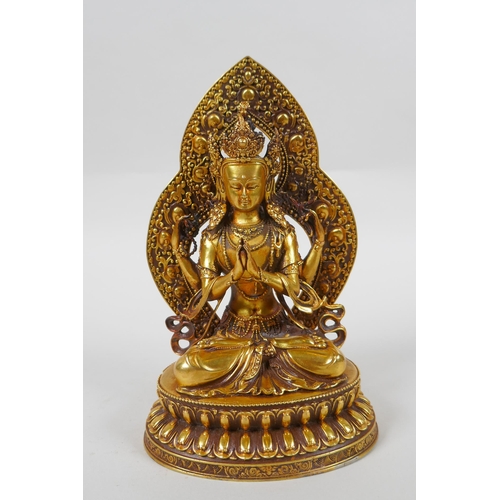 69 - A Sino Tibetan gilt bronze figure of Buddha, double vajra mark to base, 17cm high