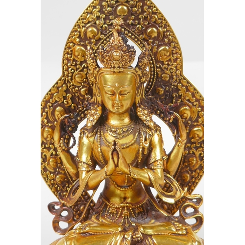 69 - A Sino Tibetan gilt bronze figure of Buddha, double vajra mark to base, 17cm high