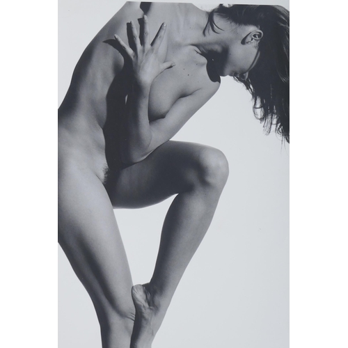 72 - John Swannell, (British, b.1946), dancing female nude, photographic print, studio stamp verso, 40 x ... 