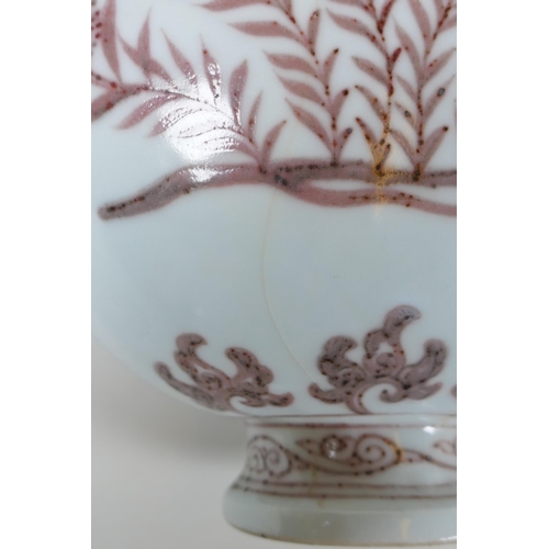 73 - A red and white porcelain two handled moon flask with floral decoration, Chinese Xuande 6 character ... 