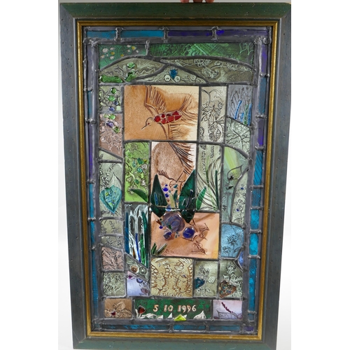 75 - A stained glass artwork panel decorated with birds, monogrammed PM, 42 x 68cm