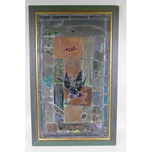 75 - A stained glass artwork panel decorated with birds, monogrammed PM, 42 x 68cm