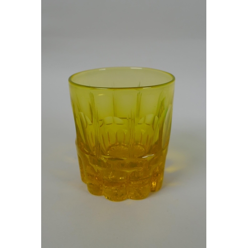 79 - A Victorian uranium pressed glass tumbler and another, and a Walsh blue Pompeian glass grapefruit di... 