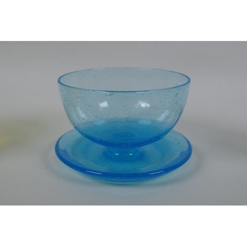 79 - A Victorian uranium pressed glass tumbler and another, and a Walsh blue Pompeian glass grapefruit di... 