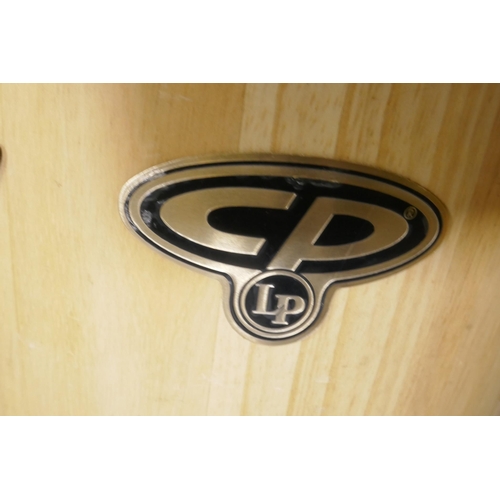 81 - A pair of Latin percussion CP Congas and stand, 30cm diameter and 33cm diameter