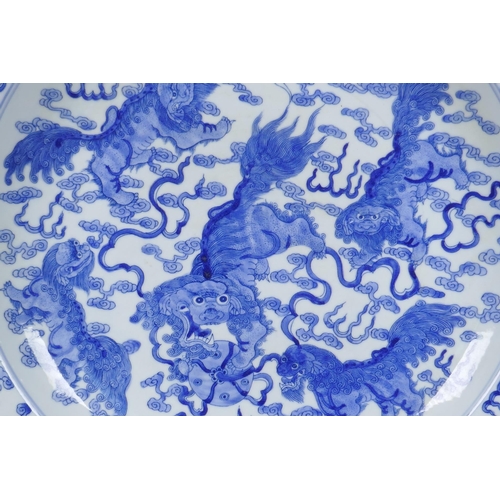 85 - A blue and white porcelain charger with lobed rim and kylin decoration, Chinese KangXi 6 character m... 