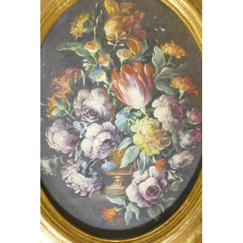 864 - A pair of still life, flowers, in the C18th style, unsigned, in oval gilt frames, C20th, oils on boa... 