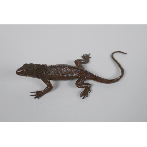 87 - A Japanese style bronze okimono lizard, 15cm long, impress mark to belly