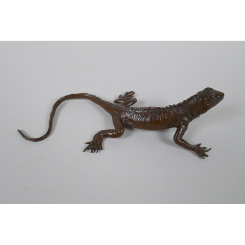 87 - A Japanese style bronze okimono lizard, 15cm long, impress mark to belly