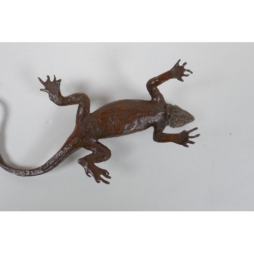 87 - A Japanese style bronze okimono lizard, 15cm long, impress mark to belly