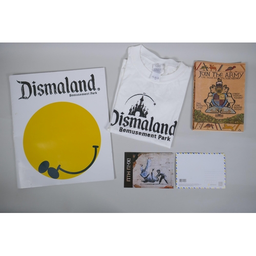 881 - After Banksy, a Dismaland brochure, Dismaland T-shirt (child size M), and two FCK-PTN! postcards, an... 