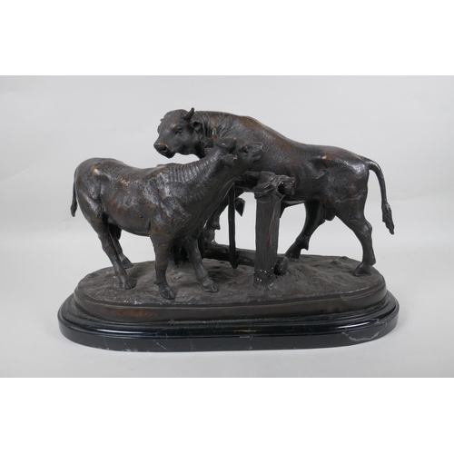 95 - After Pierre-Jules Mene, (French 1810-1879), bronzed metal figure of a cow and bull, on a marble sta... 