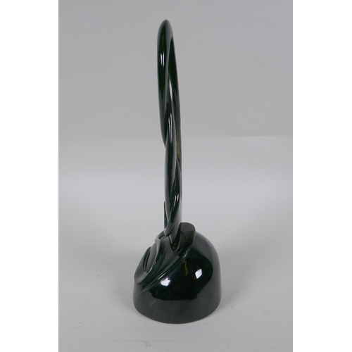 96 - A carved New Zealand spinach jade (Pounamu) abstract sculpture, 27cm high