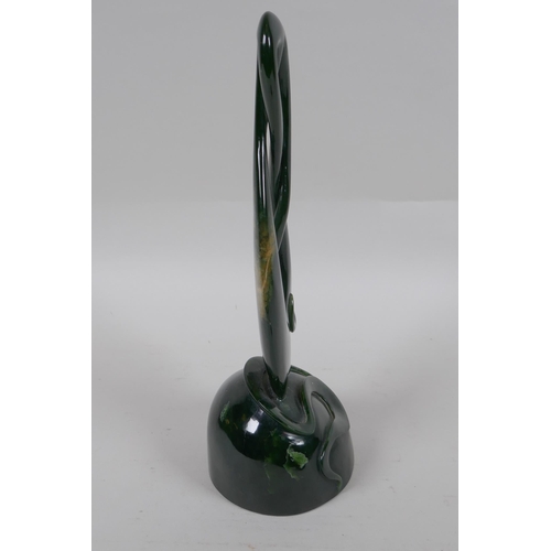 96 - A carved New Zealand spinach jade (Pounamu) abstract sculpture, 27cm high