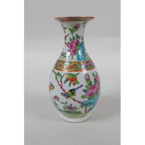 98 - A late C19th Cantonese famille vert porcelain vase decorated with birds and butterflies amongst flow... 