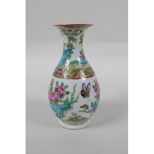 98 - A late C19th Cantonese famille vert porcelain vase decorated with birds and butterflies amongst flow... 