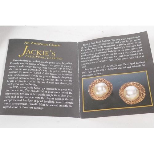 657 - A pair of faux pearl 'Jackie's' (Kennedy) replica earrings, and a 9ct gold ring set with a large pea... 