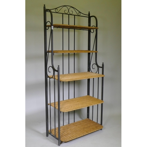 1117 - A folding metal pot rack with five wicker shelves, 80 x 42 x 186cm