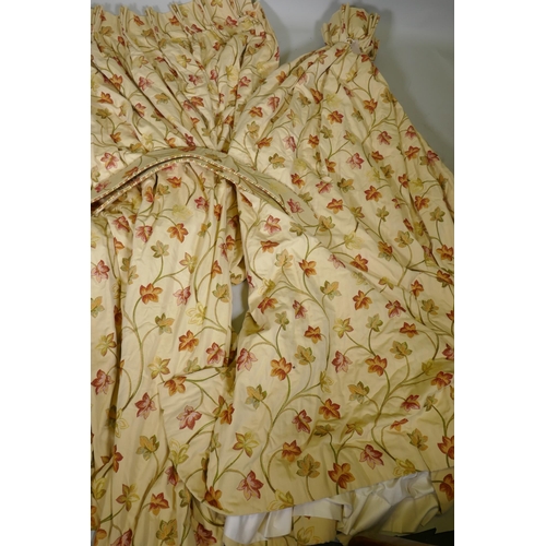 266 - A pair of crewel work style embroidered curtains, with tie backs, drop 210cm, 278cm width at bottom ... 