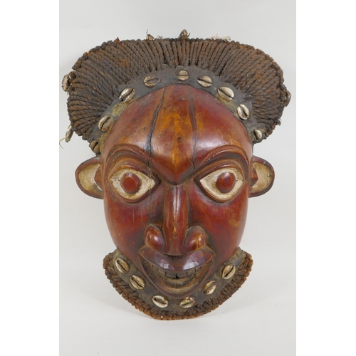 1 - A West African Bamileke wood mask, 28 x 36cm