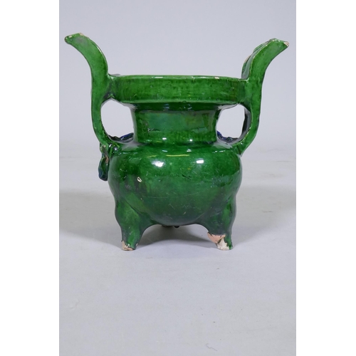 10 - A Chinese Sancai glazed terracotta ding censer, with moulded decoration, on tripod supports, 17cm hi... 