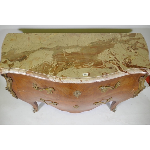 1001 - A French bombe shaped two drawer kingwood commode, with ormolu mounts and marble top, raised on swep... 