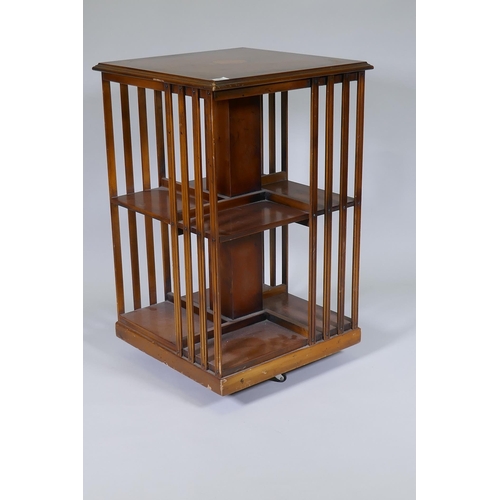 1007 - Inlaid yew wood veneered revolving bookcase, 50 x 50 x 80cm