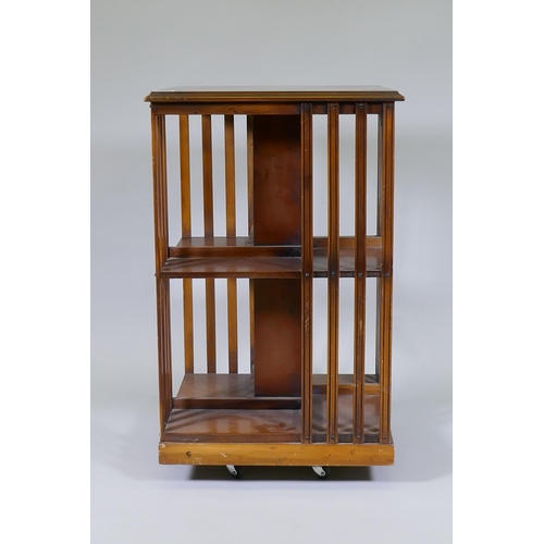 1007 - Inlaid yew wood veneered revolving bookcase, 50 x 50 x 80cm